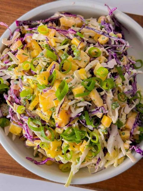 Hawaiian Coleslaw - Sweet & Savory - Foodology Geek Asain Coleslaw, Hawaiian Food Party, Hawaiian Salads, Hawaiian Coleslaw, Kalua Pulled Pork, Hawaiian Side Dishes, Pineapple Coleslaw Recipe, Hawaiian Salad, Southern Coleslaw