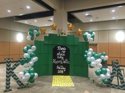 Wizard of Oz Bid Day Theme! There's no place like Kappa Delta.  Backdrop made of cardboard There’s No Place Like Homecoming Theme, No Place Like Homecoming Theme, Wizard Of Oz Bid Day Theme, Wizard Of Oz Bid Day, Emerald City Theme, Oz Decorations, Rome Party, Ward Activities, Recruitment Graphics