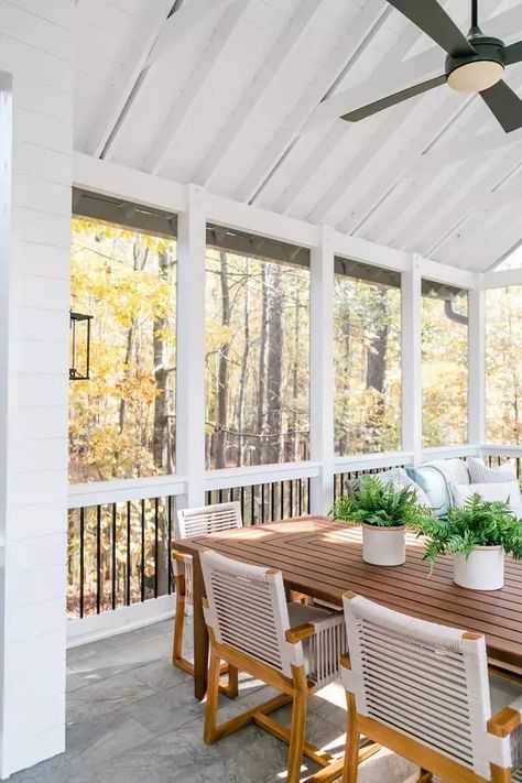 a modern screened patio with neutral furniture with pillows, a stained table and cool woven chairs, potted greenery Small Screened Porch, Screened In Porch Furniture, Screened Patio, Screened Porch Decorating, Porch Interior, Porch Design Ideas, Screened Porch Designs, Enclosed Porch, Screened In Deck