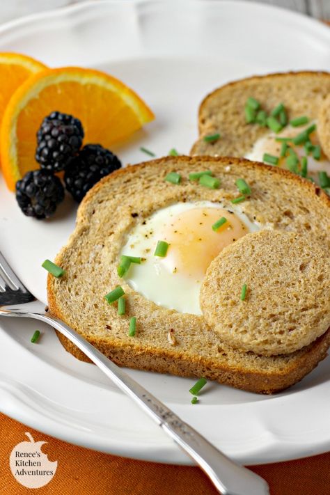 Baked Eggs in a Basket | by Renee's Kitchen Adventures - Easy recipe for baked eggs in a basket aka eggs in hole perfect for breakfast or brunch Eggs In A Hole, Basic Deviled Eggs Recipe, Crowd Breakfast, Egg In A Hole, Eggs In A Basket, Brunch Inspiration, Sweet Breakfast Treats, Breakfast For A Crowd, Baked Eggs