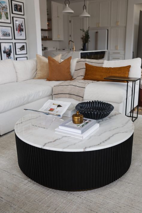 Coffee Table Statement Piece, Round Coffee Table Sectional Couch, Marble Round Coffee Tables, Round Marble Coffee Table Styling, Round Marble Top Coffee Table, Black Marble Coffee Table Living Rooms, Marble Oval Coffee Table, Marble Coffee Table Styling, Black Coffee Table Living Room