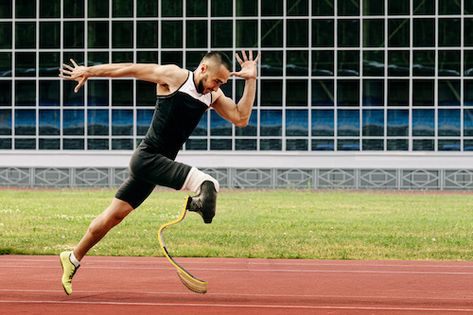 A wide shot of a Paralympic male athlete running down the track. Runner Athlete, Physically Disabled, Adaptive Sports, Running Photos, Start Running, Shot Put, Physical Disabilities, Paralympic Games, Winter Event