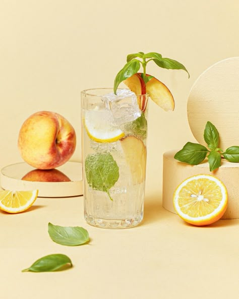 Lavender Lemonade Aesthetic, Lemonade Product Photography, Basil Lemonade Recipe, Lemonade Photography, Sparkling Water Recipes, Peach Basil, Summer Drink Recipe, Flavoured Vodka, Sliced Peaches