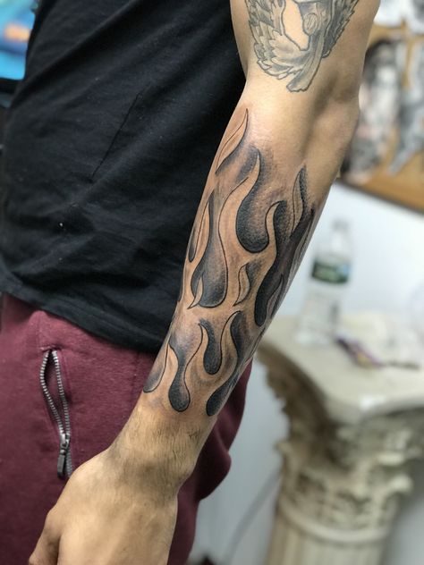 Flame tattoo by rokmatic Ink Men Flame Tattoo, Fire Forearm Tattoo Men, Fire Tattoo For Men Half Sleeves, Men’s Fire Tattoo, Flame Tattoos Sleeve, Forearm Fire Tattoo, Flame Forearm Tattoo Men, Tattoo Flames Fire, Tattoo Flames Arm