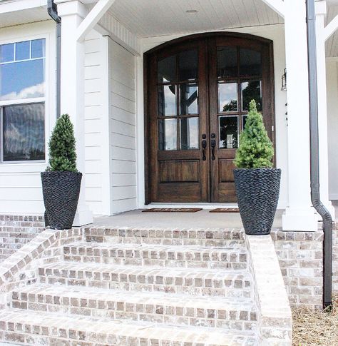 Whitewashed exterior brick. Modern farmhouse with Whitewashed exterior brick porch Magnolia Ridge" General Shale, Ivory Mortar #Whitewashedexteriorbrick #Whitewashedbrick White Wash Brick Exterior, Farmhouse Front Porch Decorating, Farmhouse Front Porch Decor, Brick Porch, Front Porch Steps, Brick Steps, Modern Rustic Farmhouse, Building A Porch, Farmhouse Front Porches