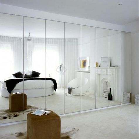 White mirrored bedroom. Mirrored storage kills two birds with one stone, and creates a light, bright and airy bedroom.  #Sleeptember White Mirror Bedroom, Airy Bedroom, Mirror Wall Bedroom, Mirrored Wall, Mirrored Wardrobe, 아파트 인테리어, Bedroom Wardrobe, Trendy Bedroom, Bedroom Mirror