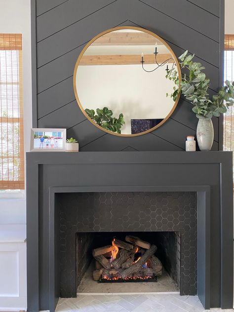 NEAT method- Simplified decor, dark mantle, mantle decor, family room, fireplace gray, brass mirror, round mirror, painted mantle, home design, modern design, digital frame, organization Contrasting Fireplace Wall, Framed Out Fireplace, Hanging Lights Above Fireplace, Charcoal Mantle, Dark Gray Painted Fireplace, Dark Grey Mantle, Dark Fireplace Wall Paint, Gold Accent Fireplace, Dark Gray Mantle