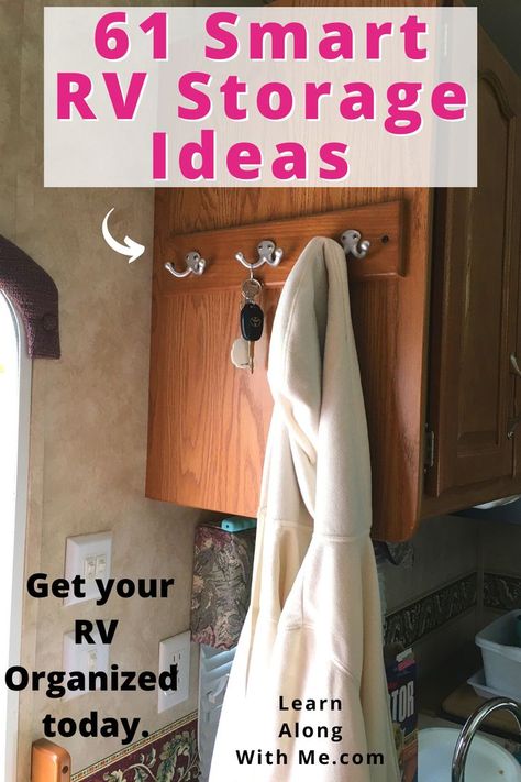 Coat hooks near your RV door can be an easy way to help organize the entryway. Convenient spot for your keys, coats and hats. 
This is just one of the RV storage ideas featured in this article. 
A lot of RV owners don't like screwing into their walls, so you can get around this by screwing organizers into the side of wooden cabinets. (Like they've done in this picture.)

If you want more RV hacks and RV organization ideas, check out the article. Will one work for you?

#rvstorageideas  #Rvhacks Camper Broom Storage, Rv Entryway Organization, Camper Coat Rack, Rv Room Divider, Rv Coat Storage, Rv Shoe Organization, Rv Corner Cabinet Storage Ideas, Rv Coat Rack Ideas, Rv Wardrobe Storage Ideas