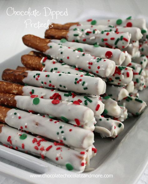 White Chocolate Dipped Pretzel Rods-easy to make and always make a great impression! Chocolate Covered Pretzel Sticks, Chocolate Dipped Pretzel Rods, Chocolate Dipping, White Chocolate Covered Pretzels, Dipped Pretzel Rods, Christmas Pretzels, Chocolate Covered Pretzel, White Chocolate Bark, Chocolate Covered Pretzel Rods