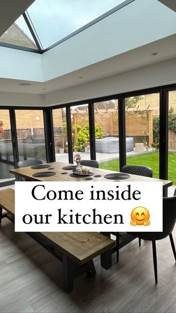 Emily | Project Ivel 🏡 on Instagram: "Come inside my bifolds with me 🤗 We love our open plan kitchen and find it’s the perfect space to hang out with our family and friends. I get messages asking why is my living room so small but actually we do have a separate living room. I’m actually more than grateful for the space we do have! 🥰 Our new rug goes perfectly and replaces the shaggy one which got so much stuck inside it 🙈 @therugseller Ad #gardensofinstagram #gardeninspiration #ukgarde Kitchen Dining Snug Open Plan, Narrow Kitchen Diner Extension, Kitchen Extension Glass Roof, Kitchen Extension Ideas Open Plan, L Shaped Kitchen Diner Family Room, Separate Living Room And Kitchen, Living Room Extension Ideas, Small Kitchen Extension, Kitchen Living Area Open Plan