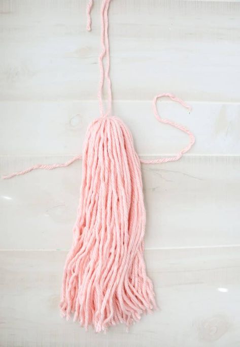 DIY Giant Tassel Wall Hanging - A Beautiful Mess Large Tassels, Tassel Wall Hanging, Things To Create, Tassel Wall Hang, Tassel Wall, La Chose, Yarn Wall Art, Yarn Wall, A Beautiful Mess