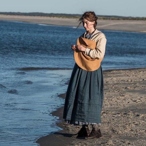 Allegory Of on Instagram: “Jo March (Saoirse Ronan) lingers on the beach, holding her hat, in a scene inspired by Winslow Homer’s High Tide painting. Costume design…” Jo March, Saoirse Ronan, Hollywood Reporter, Costume Designer, Little Women, The Beach