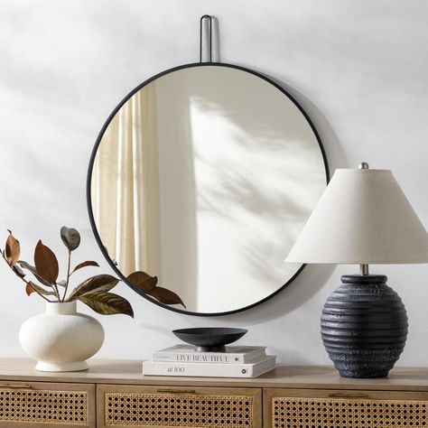 This Jayline mirror is the perfect addition to your modern interior. Its sleek, minimalist design is sure to bring a contemporary touch to any room in your home. The simple shape and clean lines of this stunning piece will effortlessly blend into any d? Black Wall Mirror, Contemporary Wall Mirrors, Circular Mirror, Accent Mirror, Metal Mirror, Framed Mirror Wall, Metal Homes, Accent Mirrors, Home Decor Trends