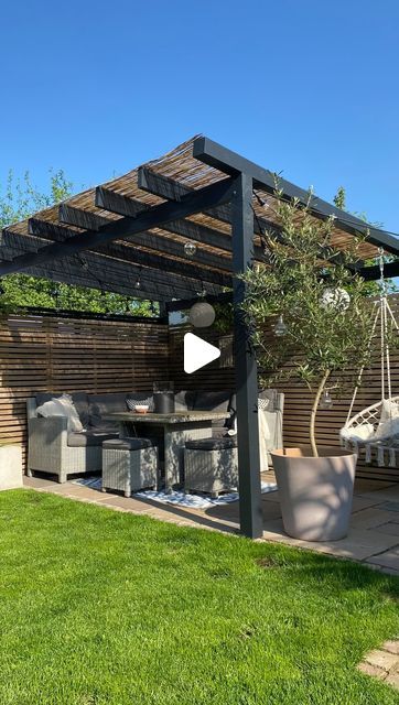 Sarah | Interiors & DIY on Instagram: "DIY pergola

It’s almost 3 years since we made our own pergola. Unable to find a kit to fit the corner as we wanted, we headed off to our local timber yard, put pen to paper and created a simple structure. We then painted it black and added some reed-on-a-roll to create shade, with corrugated plastic over the top to make the area waterproof. Now we are able to enjoy the space throughout the summer months, regardless of the weather 🖤

Pergola is painted in Off-Black exterior eggshell by @farrowandball (previously declared gift)

#projectgarden #gardenproject #gardenideas #gardeninspo #gardendesign #gardendiy #diypergola #gardenpergola #pergola #gardenrenovation #patiofurniture #patioinspro #gardenpatio #southfacinggarden #gardening #gardenplants #love Small Urban Garden Design, Small Urban Garden, Urban Garden Design, Pergola Ideas, Pergola Design, Diy Pergola, Small Backyard Patio, Pergola Designs, Small Backyard Pools