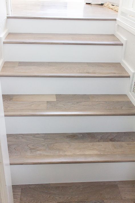 want more of an overhang than this... We have new stair railing! | Jenna Sue Design Blog Laminate Stairs, Transition Ideas, درج السلم, Transition Flooring, Floor Furniture, Hardwood Stairs, Flooring For Stairs, Staircase Remodel, Staircase Makeover