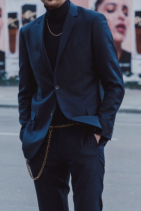 What to Wear With a Blue Suit | Men's Fashion | OpalbyOpal.com Mens Suit With Necklace, Men Suit Jewelry, Turtleneck Necklace Men, Suits With Chains, Blue Suit With Black Shirt, Dark Blue Prom Suits, Blue Suit Aesthetic, Prom Suits For Men Blue, Blue And Gold Suit