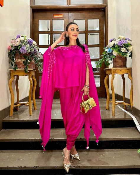 Mehak Jain in Pink City @mehakk.jain wears our bandhani co-ord set with an off shoulder kaftan with delicate shell embroidery, paired with dhoti pants. Shop the look on www.pinkcitybysarika.com #PinkCity #PinkCityBySarika #10YearsOfPinkCityBySarika #PinkCityWomen Off Shoulder Kaftan, Shell Embroidery, Dhoti Pants, Pink City, Co Ord Set, Shop The Look, Beaded Bags, Co Ord, Look On