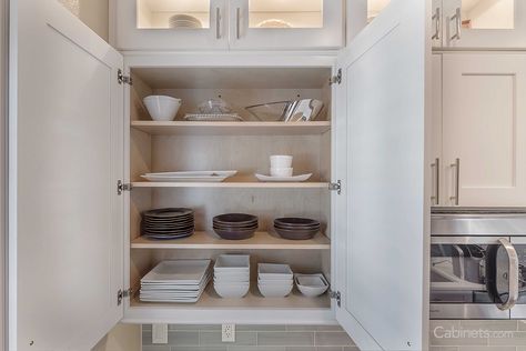 Classic White Kitchen with Subway Tile and Stacked Glass Uppers - Cabinets.com White Kitchen With Subway Tile, Kitchen With Subway Tile, Cheerful Kitchen, Clear Chairs, Upper Kitchen Cabinets, Classic White Kitchen, Subway Tile Kitchen, Maple Cabinets, Door Styles