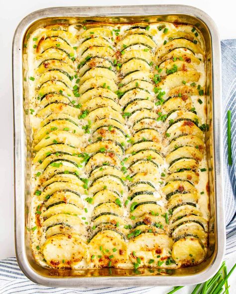 This Zucchini Potato Bake is chock full of goodness - it's creamy and delicious with just the right amount of cheese and spices, giving it lots of flavour! #zucchini #potato #bake #sides #recipe Tender Baked Chicken Breast, Zucchini In The Oven, Zucchini Recipes Baked, Onion Casserole, Zucchini Side Dishes, A Couple Cooks, Baked Squash, Baked Zucchini, Zucchini Casserole