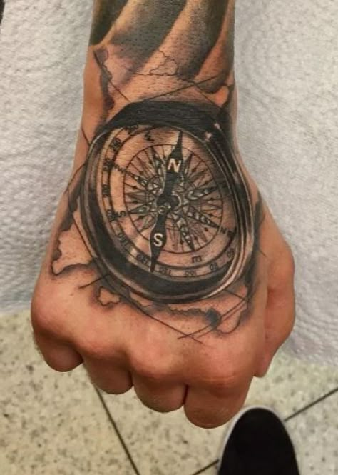 150 Trendy Hand Tattoos for Men You Must See - Tattoo Me Now Compass Hand Tattoo, Hand Tattoo Meaning, Viking Compass Tattoo, Compass Tattoo Meaning, Hand Tatts, Nautical Compass Tattoo, Compass Tattoo Men, Compass Tattoos, Best Compass