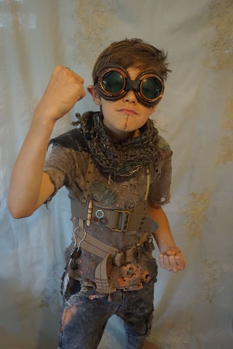 *post apocalypse kid, created by Fable Dresses on etsy*... children costume halloween city of ember wasteland weekend road warrior mad max apocalyptic Road Warrior Costume, Mad Max Family Costume, Kid Apocalypse, Post-apocalyptic Masks For Cosplay Events, Post-apocalyptic Cosplay Costume For Events, Hooded Post-apocalyptic Outerwear For Halloween, Post-apocalyptic Mask For Costumes, Apocalypse Costume, Fable Dresses