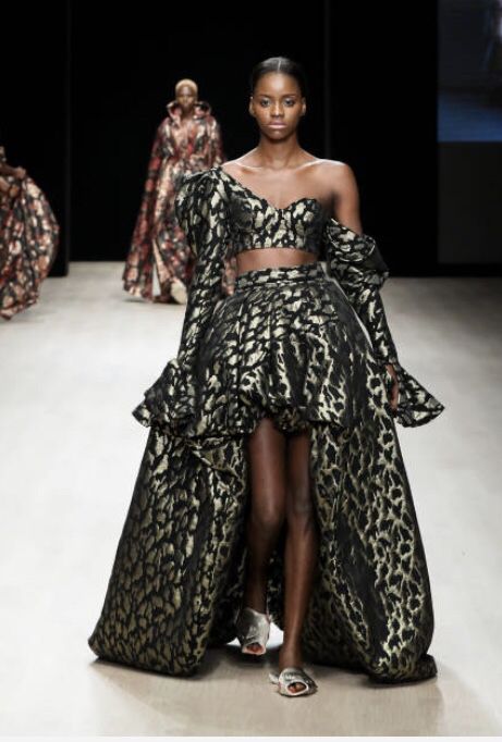 A model wearing Selam Fessahaye walks the runway during Arise Fashion Week on April 19, 2019 in Lagos, Nigeria. #TheStreetStyleR #ontherunwayafrica #selamfessahaye Models Runway Walk, Selam Fessahaye, Runway Walk, Model Runway, Lagos Nigeria, Role Model, April 19, Role Models, High Low Dress