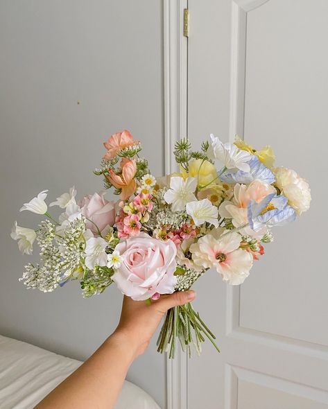 Custom Bridal Bouquet for Cassidy, this sweet bride’s wedding dress has embroidered flowers around her waist and wanted a bouquet reflecting the concept, colourful flowers concentrated in the middle with white flowers surrounding creating a “halo effect”. Swipe for the dress inspo!! ✨ Wedding Flowers Moodboard, Summer Floral Bouquets, Elegant Wedding Floral Arrangements, April Flowers Wedding, Colourful Bride Bouquet, Wedding Flowers July, Colourful Bridesmaid Bouquet, Whimsical Flower Bouquet, Wedding Bouquet Colourful