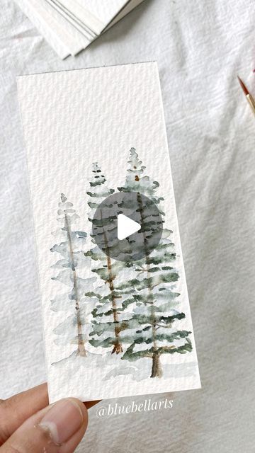 Easy Robin Painting, Snowy Tree Watercolor, Easy Watercolor Pine Trees, Pine Trees Watercolor Painting, Watercolor Art Pine Trees, Winter Water Coloring Ideas, How To Paint Pine Trees In Watercolor, How To Watercolor Pine Trees, Pine Tree Painting Tutorials