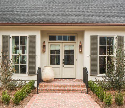 Natural Wood Shutters White House, French Creole Homes, Ranch Style Exterior Remodel, Exterior French Country Homes, White Siding With Shutters, French Colonial Style Home Exterior, Painted Ranch House Exterior, Light Brick And Siding Exterior, Traditional Home Exterior Colors