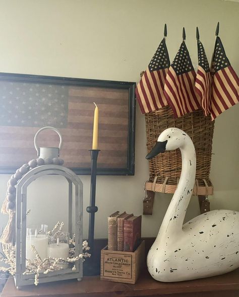 Let’s style our shelves with a mix of vintage and new decor for the 4th of July. Arrange vintage books with new patriotic bookends, add a vintage lantern next to new framed patriotic prints, and scatter a few small American flags throughout. This blend of old and new will create a charming, festive look! 🏡⭐ Show us your shelf decor for the 4th! Small American Flags, American Flags, Vintage Lanterns, Festive Look, Show Us, Shelf Decor, Country Decor, Vintage Books, Old And New