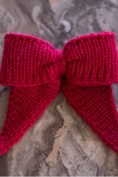 Free knitting pattern designed by Originally Lovely. Knit using the luxurious Originally Lovely Cria yarn! Knitting Bows Free Pattern, Knitted Bows Free Pattern, Knitted Bow, Knit Bow Garland, Bow Knitting Pattern, Knit Bow, Knit Bow Pattern, Knit Hair Bow, Bow Tie Scarf Knitted