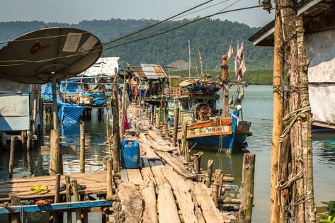 Huts and Fishing Boat at the Pier in at Fisherman Village Editorial Stock Image - Image of destinations, poor: 66307124 Fisherman Village, Village Photo, Shanty Town, Beach Village, Koh Chang, River Life, Ocean Fishing, Pier Fishing, Scenic Design