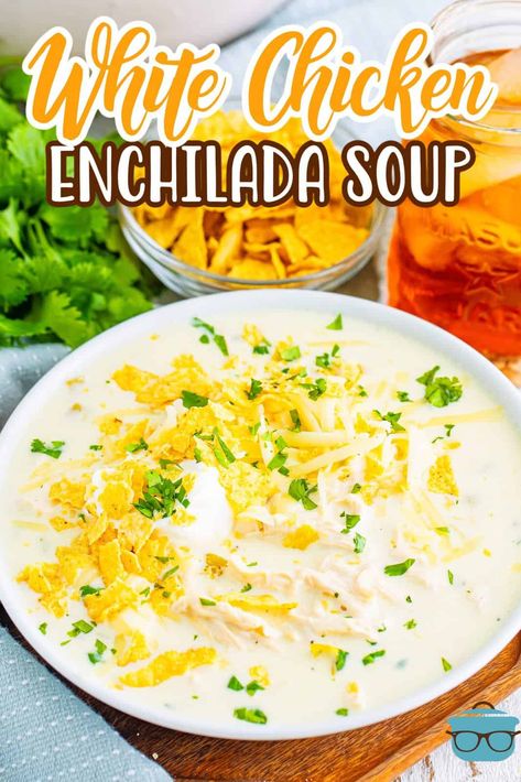 A large Dutch oven with White Chicken Enchilada Soup. White Bean Chicken Enchilada Soup, Progresso Chicken Cheese Enchilada Soup Recipes, White Chicken Enchiladas Soup, Green Enchilada Chicken Soup Crock Pot, Chicken Cheese Enchilada Soup, White Chicken Enchilada Soup Crock Pot, White Chicken Tortilla Soup Crock Pot, Creamy Enchilada Soup Crockpot, White Chicken Soup Recipes