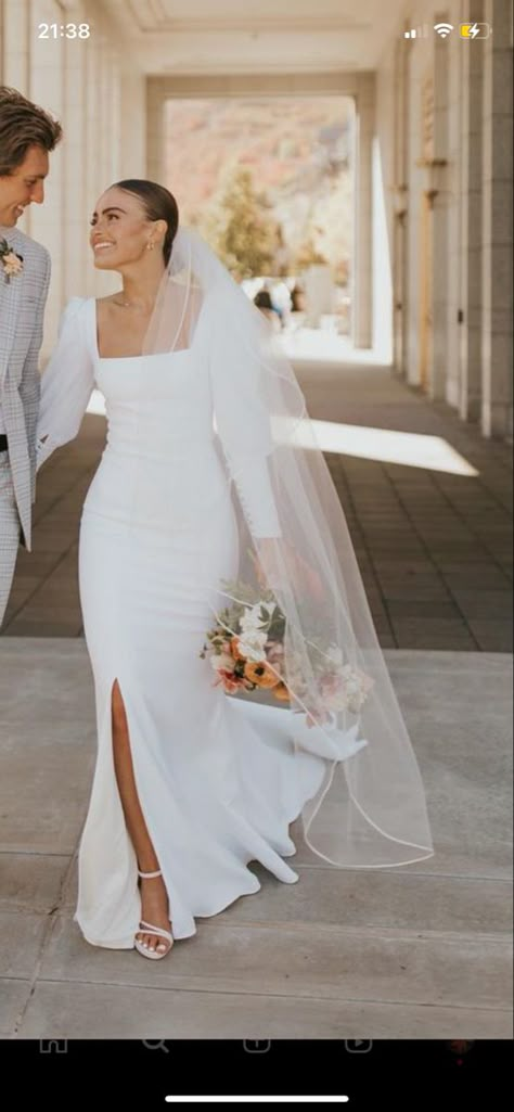 White Wedding Dresses Simple Long Sleeve, Warm Wedding Dress Winter, Simple Wedding Dresses Long Sleeve, Long Sleeved Simple Wedding Dress, Long Sleeve Lwedding Dress, Minimalist Long Sleeve Wedding Dresses, Chic Wedding Dress With Sleeves, Wedding Dresses Fitted With Sleeves, Classy Traditional Wedding Dress