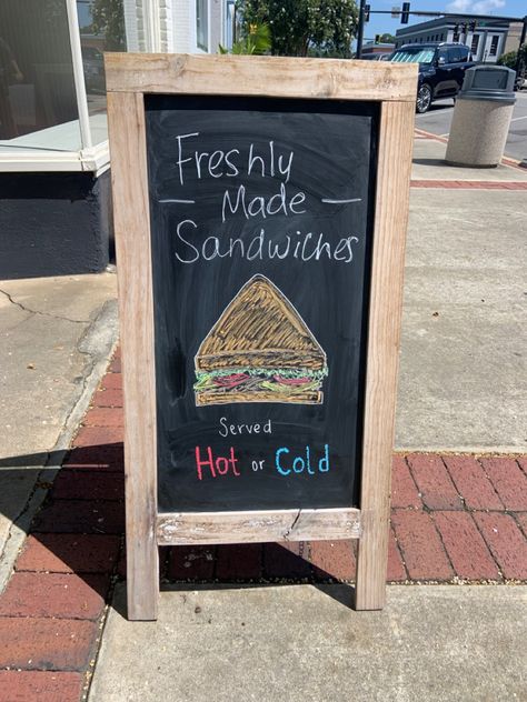 Made this sandwich sign for the place I work at! Super simple, but cute! Sandwich Board Sign, Sandwich Sign, Market Signage, Sandwich Board Signs, Panini Sandwich, Sandwich Bar, Sandwich Board, Food Graphic Design, Chalkboard Sign