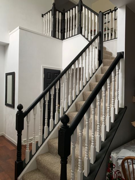 Oak stairway bannister to black - using gel stain Black White Bannister, Black Bannister White Spindles, Black And White Bannister Rail, Honey Oak Staircase Makeover, White And Black Stair Railing, Black Bannister Ideas, Black Bannister Rail, Black And White Bannister, Railing Redo