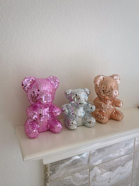 disco gummy bear + disco teddy bear - the perfect dopamine decor pieces for your space 🪩🧸 this is the perfect piece to light up every room - especially when the sun hits & light reflects :) each disco piece is handmade here in California. they are composed of mirror glass tiles that are individually placed to create the ultimate groovy statement home decor piece to your home.  dimensions:  pink: height: 9" x 5" x 6" rose gold / brown: 8" x 5" x 5" silver: 6" x 5" x 4"  custom orders upon reque Thrift Store Room Decor, Pink Things For Room, Gummy Bear Decor, Pink And Gold Room, Light Pink Decor, Disco Decor, Rose Gold Room Decor, Dream Dorm Room, When The Sun Hits