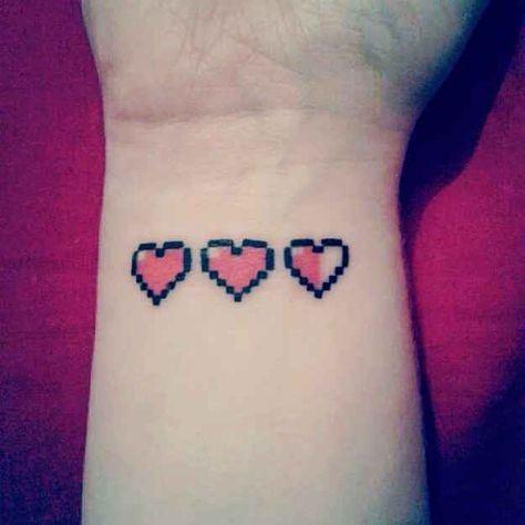 36 Insanely Geeky Tattoos Pixel Heart Tattoo, Minecraft Tattoo, Super Mario Tattoo, Pixel Tattoo, Mario Tattoo, Video Game Tattoos, Nerdy Tattoos, Zelda Tattoo, Gamer Tattoos