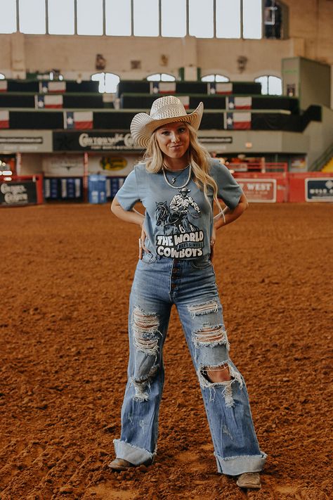 Flare jeans and boyfriend style denim are all the rage! These Distressed Wide Leg Denim jeans are sure to have you rocking the season. Pair with your favorite graphic tee and jewelry for a southern inspired look! Models are wearing a size 1 and 3. These run small, we suggest sizing up. Similar to Levi denim. No stretch Made in the USA The World Needs More Cowboys, Nfr Outfits, Cowboy Graphic, Casual Country Outfits, Cowgirl Outfit, Fest Outfits, Country Style Outfits, Western Wear Outfits, Cute Country Outfits