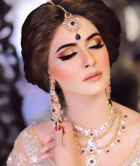 Bridal makeup , Valima makeup , peach and Golden makeup Golden Makeup Wedding, Makeup With Peach Dress Pakistani, Golden Peach Makeup, Gharara Hairstyles, Golden Dress Makeup Look, Peach Dress Makeup, Peach Bridal Makeup, Golden Bridal Makeup, Golden Dress Makeup