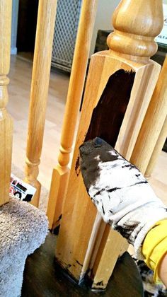 How to Refinish a wood banister with gel stain and chalk paint to a beautiful farmhouse staircase. #farmhouse #remodel #remodelingonabudget #diy #diyprojects Landing Railing Ideas, Black Banisters And Railings, Farmhouse Banister, Banisters And Railings Makeover, Oak Banister Makeover, Banister Makeover, Stained Staircase, Painted Banister, White Railing