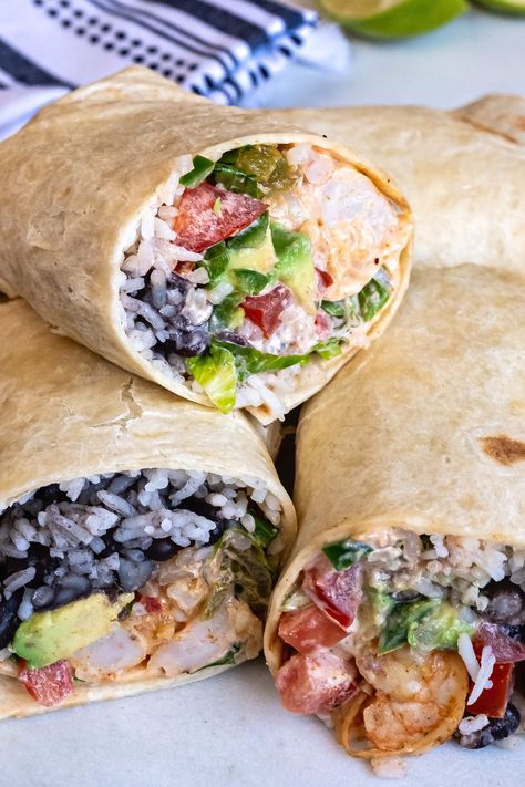 Baja Shrimp Burrito, Old Bay Shrimp Burritos, Seafood Burrito Recipe, Shrimp Wraps Recipes, Seafood Burrito, Shrimp Burrito Recipe, Shrimp Burrito Bowl Recipe, Shrimp Burrito Bowl, Shrimp Burritos