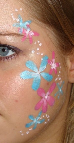 Pretty Flowers Cheek Painting Cheek Painting, Easter Face Paint, Easy Face Painting Designs, Face Painting Flowers, Festival Face Paint, Christmas Face Painting, Cheek Art, Girl Face Painting, Face Painting Tutorials