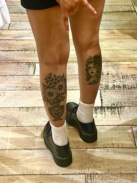 Womens Sunflower Tattoo, Leg Vase Tattoo, Large Calf Tattoo, Traditional Tattoos Words, All Black American Traditional Tattoo, Traditional Tattoo Vase Flowers, Below Knee Tattoo Traditional, Trad Rib Tattoo, Leg And Hip Tattoos