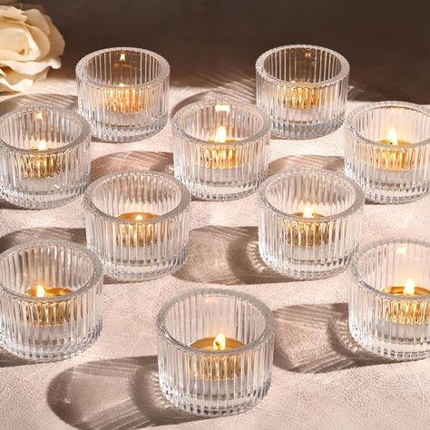 PRICES MAY VARY. 🎁Small Candle Holders Set-Great home decor: Our mini tea candle holders with special pleated stripes design, emit dazzling candlelight. Votive candles are so small that you can place them pretty much anywhere, and they add a welcoming glow throughout the house. 🎁Unique Design: Lanttu candle holders are designed with thick glass, high quality and suitable for daily continuous use. When lit, it emits warm and beautiful light, bringing you a beautiful atmosphere and mood. 🎁Candl Short Candle Holder, Mini Wedding Centerpieces, Cute Party Table Decor, Candles In Jars Wedding, Sweetheart Table Bud Vases And Candles, Simple Engagement Party Centerpieces, Simple Centerpieces Long Table, Wedding Tablescape No Plates, Centerpieces Retirement Party