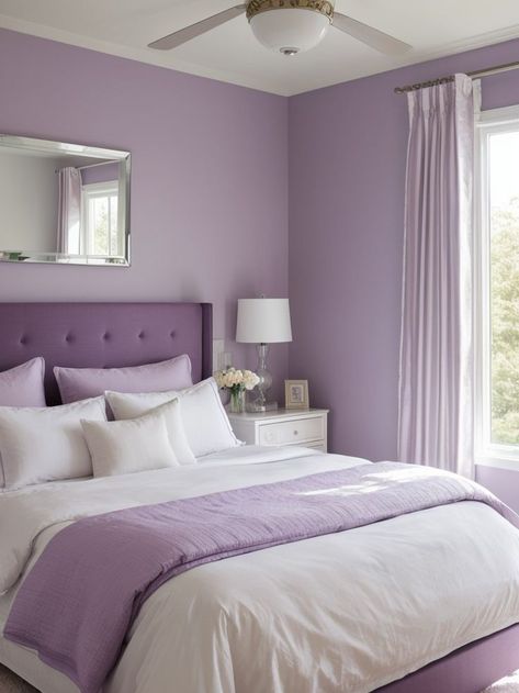 Create a soothing atmosphere in your bedroom with a light purple accent wall. Complement the wall with crisp white bedding, a mirrored nightstand, and soft floral curtains for a chic and elegant look. Modern Purple Bedroom, Light Purple Bedroom Ideas, Dark Purple Bedroom Ideas, Light Purple Bedroom, Purple And White Bedroom, Purple And Gray Bedroom Ideas, Lilac Bedroom Ideas, Purple And Gray Bedroom, Purple Themed Bedroom