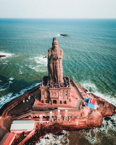 The Thiruvalluvar Statue, or the Valluvar Statue, is a 133-feet tall stone sculpture of the Tamil poet and philosopher Valluvar, author of… Thiruvalluvar Statue, Indian Temple Architecture, Kanyakumari, Picture Credit, Incredible India, India Travel, Most Beautiful Places, Wonderful Places, Wonders Of The World