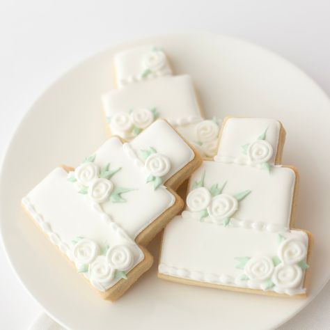 Introducing our ✨NEW✨ Wedding Cookie Collection! Same classics, but now with a sharp tux and a floral upgrade. Who needs cake when your cookies are this good? 😏 Wedding Iced Cookies, Wedding Cake Cookies Decorated, Wedding Cookies Decorated Simple, Wedding Sugar Cookies Decorated, Cake Sugar Cookies, Wedding Cake Sizes, Wedding Dress Cookies, Cookie Decorating Kit, Unique Engagement Gifts