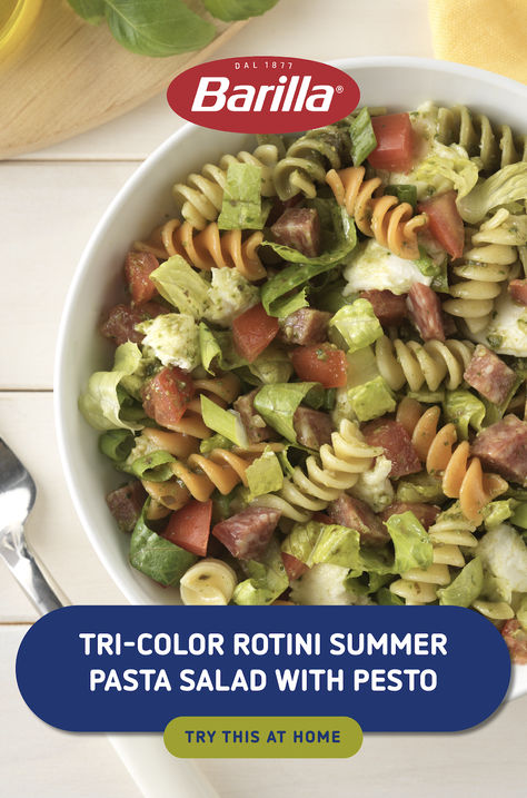 This colorful pasta salad is the perfect recipe for your next picnic. Barilla Tri-Color Rotini pasta is combined with lettuce, green onion, tomatoes, and mozzarella cheese Italian dry salami and Barilla Rustic Basil Pesto to bring everything together into one delicious summer dish. Enjoy this pasta salad outdoors with friends and family when you can bask in the sunny summer weather. Barilla Pasta Salad Recipes, Pasta Salad With Pesto, Banza Rotini Pasta Recipes, Tri Color Rotini Pasta Recipes, Barilla Pasta Recipes, Rainbow Rotini Pasta Salad, Tri Colored Pasta Salad Italian, Tri Color Rotini Pasta Salad, Summer Pasta Salad Recipes