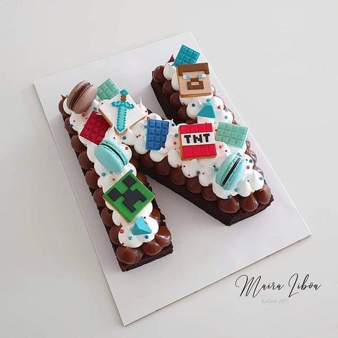 Letter cake by Maira Liboa Number 7 Minecraft Cake, Minecraft Cookie Cake, Minecraft Number Cake, Minecraft Party Food, Minecraft Cupcakes, Letter Cakes, Birthday Care Packages, Cake Lettering, Letter Cake